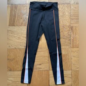 PE Nation black XS midrise workout leggings w/ orange piping and white detail